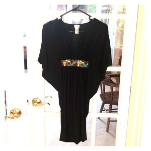 Black cache evening dress.